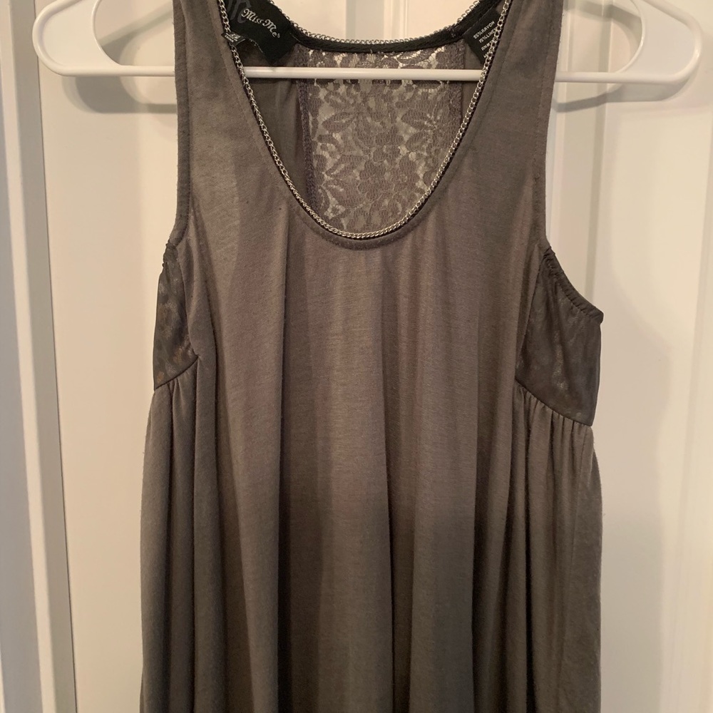 Gray flowy top.